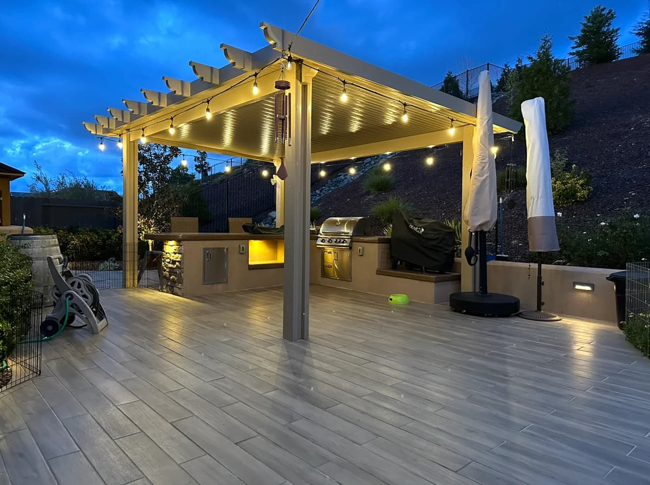 Custom solid patio cover with integrated lighting installed on a Sacramento-area home by DCI Patios